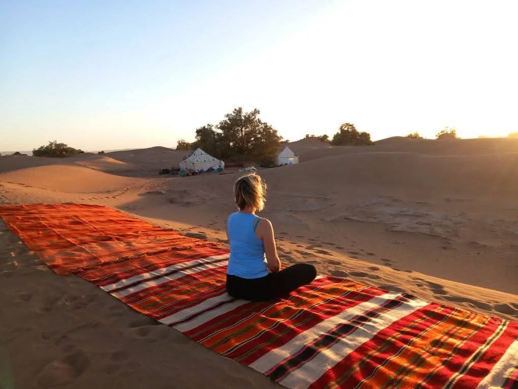 Meditation during a desert retreat in the Moroccan Sahara near M’Hamid El Ghizlane